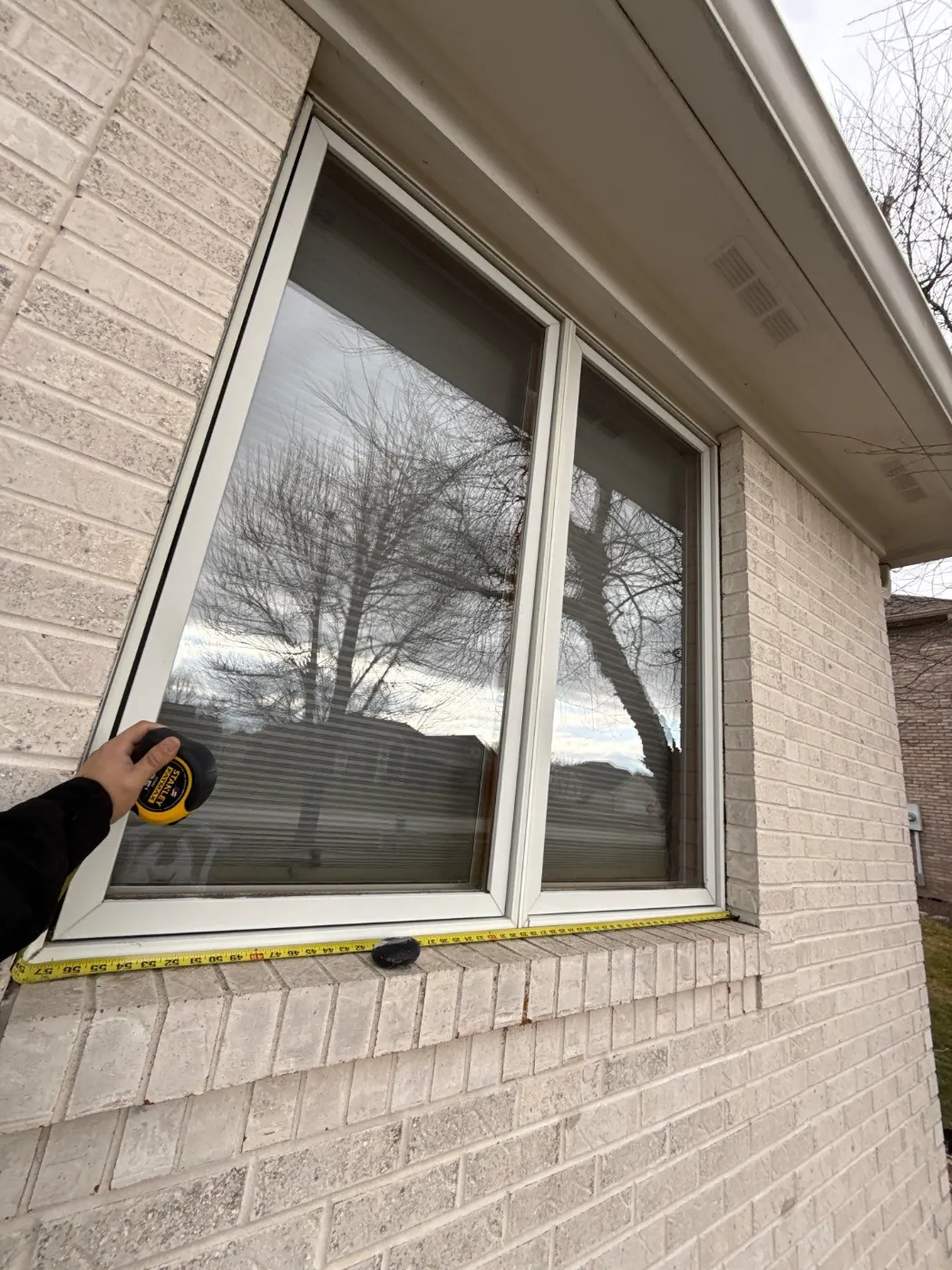 Frame and seal detail on a Olive Branch Manor window job